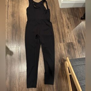 Free people FP Movement Illuminate onesie with cutout detail size L